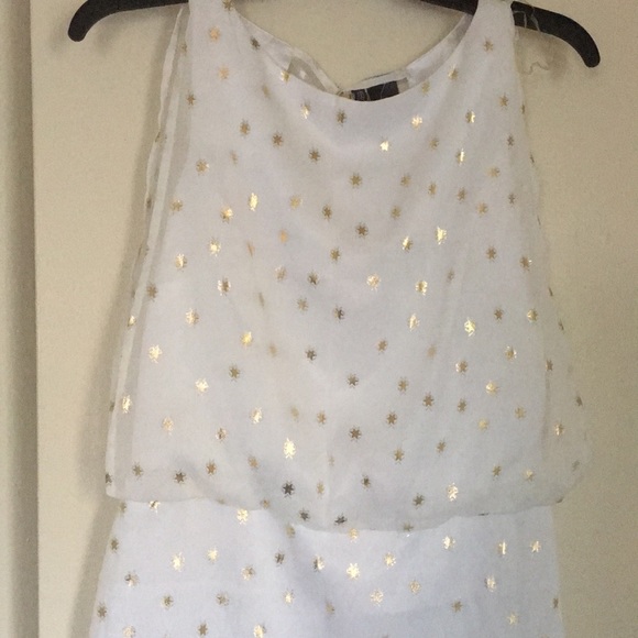 white dress with gold stars